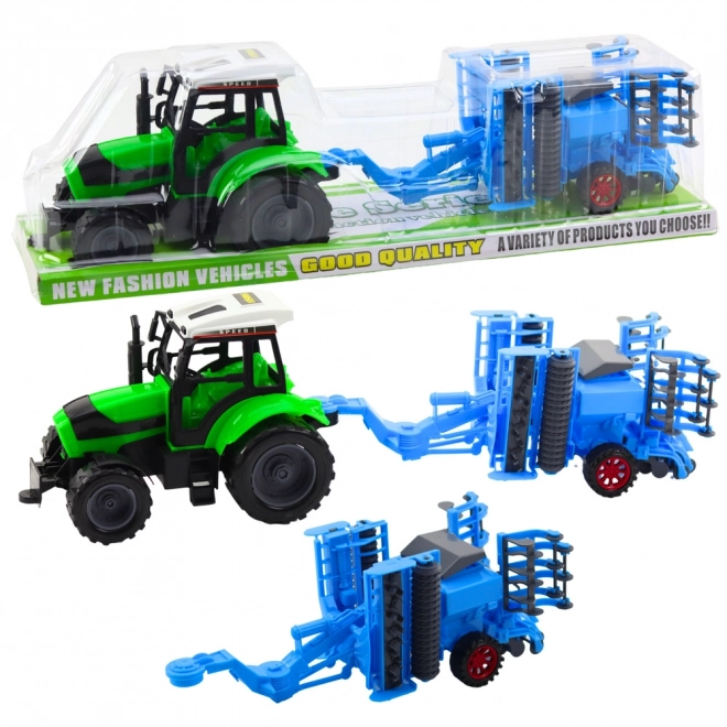 Nagy mezőgazdasági traktor tárcsás boronával