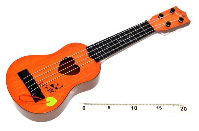 Gitár pengetővel 43 cm