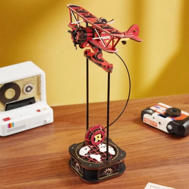 Fa 3D modell kétfedelű repülőgépről inga mechanizmussal