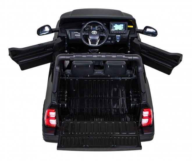Toyota Hilux akkumulátor gyerekeknek fekete + 4x4 hajtás + távirányító + 2 csomagtartó + MP3 rádió + LED dióda