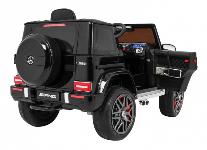 Mercedes AMG G63 gyerekeknek Lakk fekete + távirányító + MP3 LED + lassú indítás + EVA + biztonsági öv