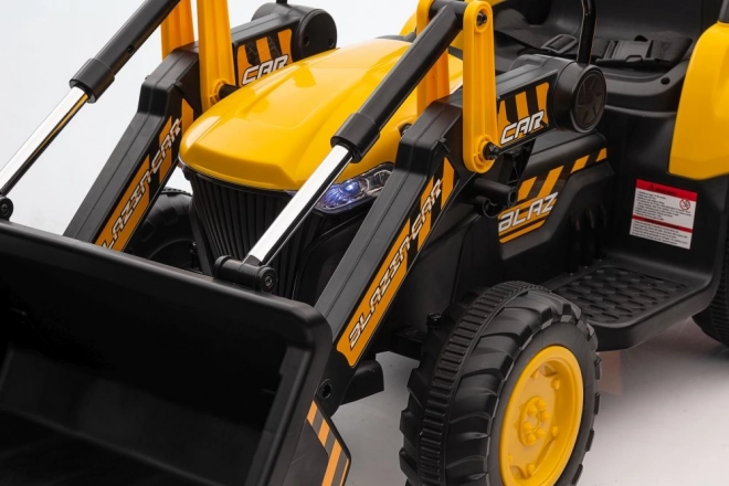 Akkumulátoros traktor kanállal sárga