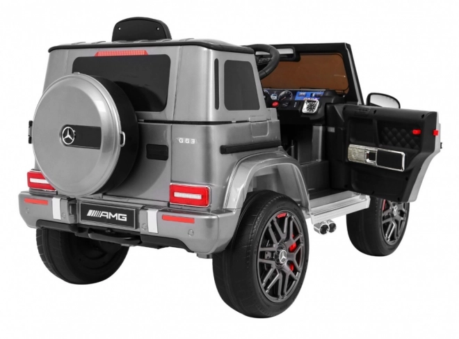 Mercedes AMG G63 gyermekeknek Ezüst festék + távirányító + MP3 LED + lassú indítás + EVA + övek