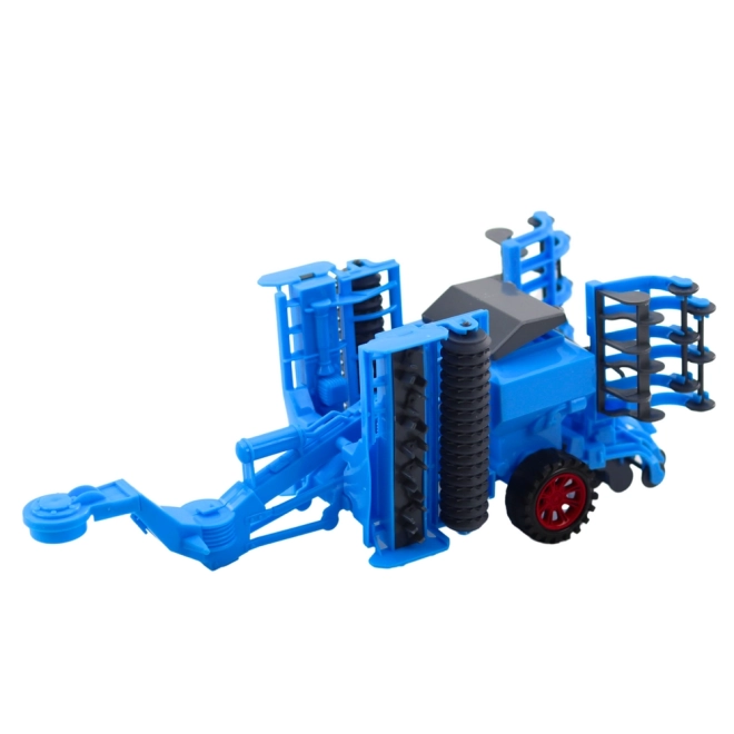 Nagy mezőgazdasági traktor tárcsás boronával