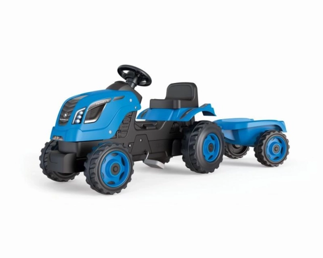 Farmer XL kék pedálos traktor utánfutóval