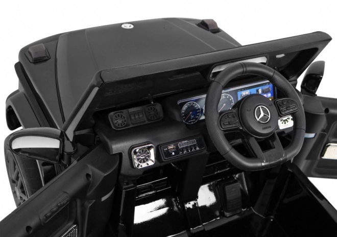 Mercedes AMG G63 gyerekeknek Lakk fekete + távirányító + MP3 LED + lassú indítás + EVA + biztonsági öv