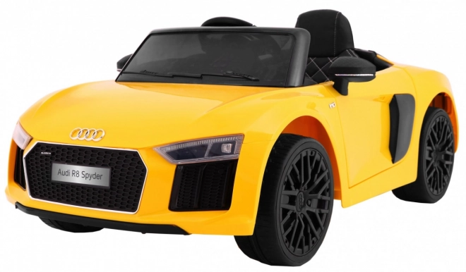 Audi R8 Spyder akkumulátorpakk Sárga + Távirányítás + EVA + Lassan indul + Rádió MP3 + LED dióda