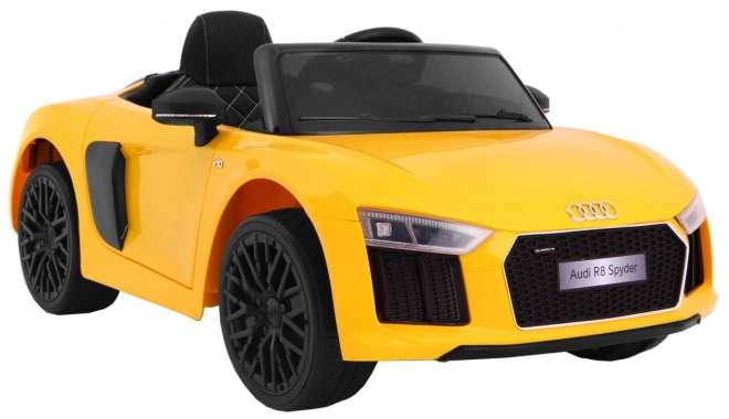 Audi R8 Spyder akkumulátorpakk Sárga + Távirányítás + EVA + Lassan indul + Rádió MP3 + LED dióda
