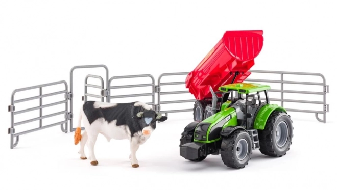 Traktor játék utánfutóval és bikával