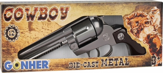 Metal revolver cowboy stílusban