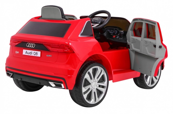 Audi Q8 emelő gyerekeknek akkumulátor Piros + Távvezérlés + EVA + Lassú indítás + MP3 USB + LED lámpa