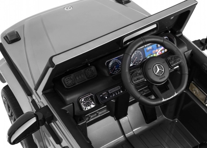 Mercedes AMG G63 gyermekeknek Ezüst festék + távirányító + MP3 LED + lassú indítás + EVA + övek