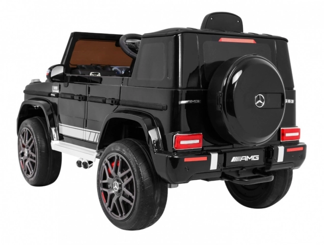 Mercedes AMG G63 gyerekeknek Lakk fekete + távirányító + MP3 LED + lassú indítás + EVA + biztonsági öv