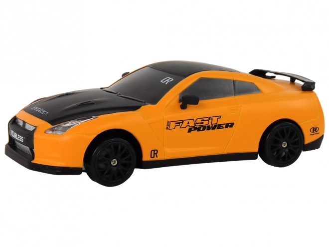 Távirányítós sportkocsi R/C 1:24 cserélhető kerekek – Sárga