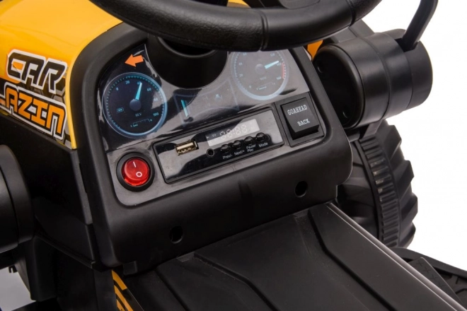 Akkumulátoros traktor kanállal sárga