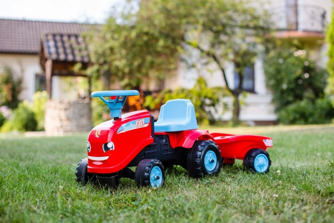 Lábbal hajtható - Go Farm traktor piros kormánnyal és utánfutóval