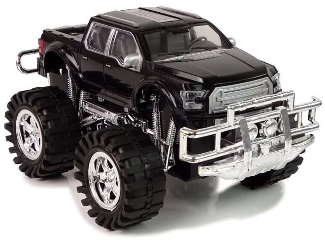 Járműkészlet fekete monster truck és fehér BMW trélerrel