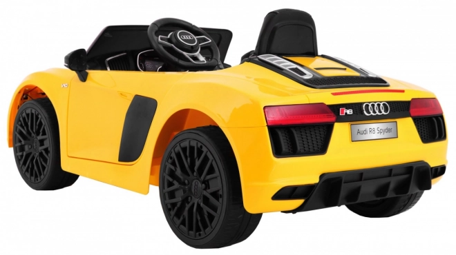 Audi R8 Spyder akkumulátorpakk Sárga + Távirányítás + EVA + Lassan indul + Rádió MP3 + LED dióda