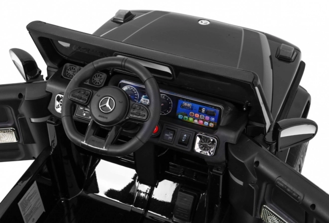 Mercedes AMG G63 gyerekeknek Lakk fekete + távirányító + MP3 LED + lassú indítás + EVA + biztonsági öv