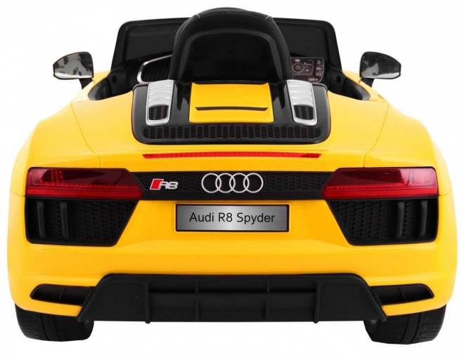 Audi R8 Spyder akkumulátorpakk Sárga + Távirányítás + EVA + Lassan indul + Rádió MP3 + LED dióda