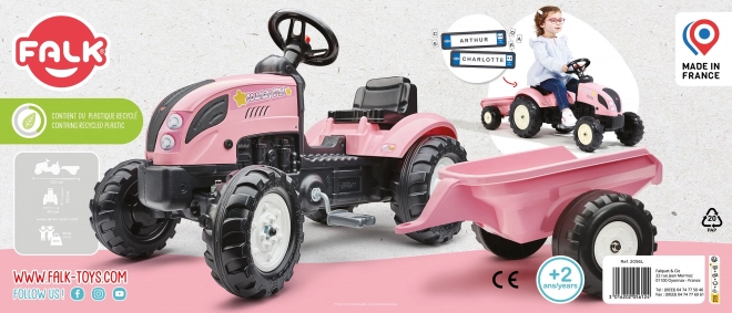 Lánctalpas rózsaszín traktor utánfutóval