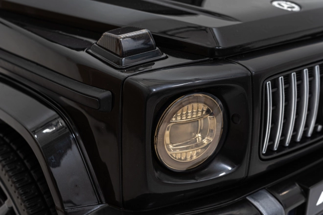 Mercedes AMG G63 gyerekeknek fekete + távirányító + MP3 LED + lassú indítás + EVA + övek
