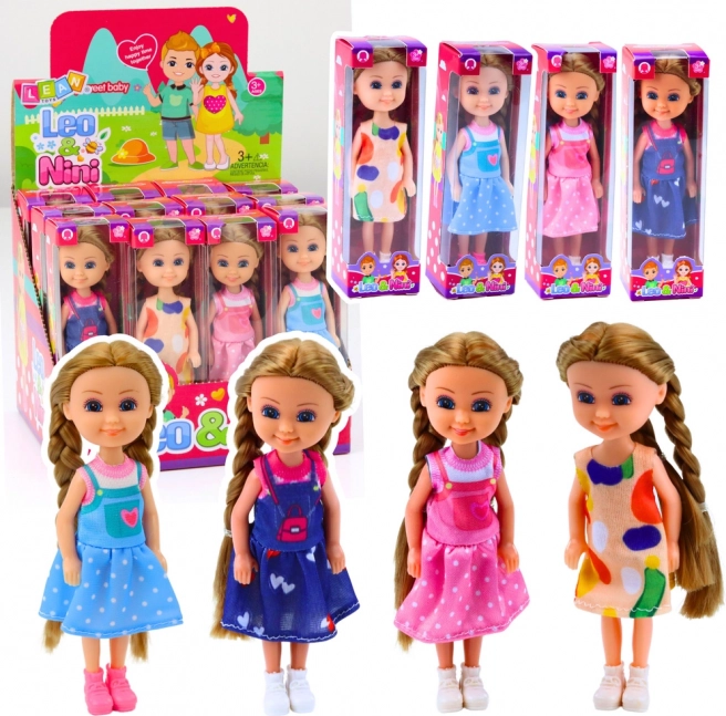 Mini baba hosszú hajjal és ruhában 15 cm