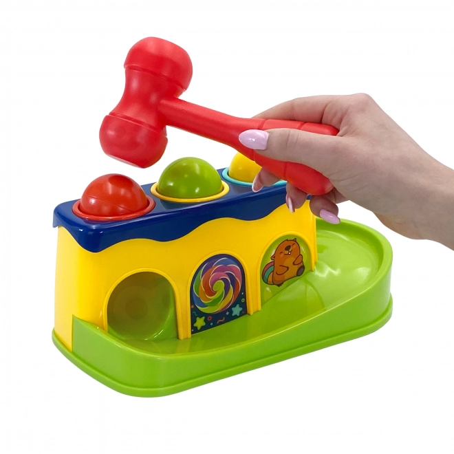 Woopie színes kalapálós játék Montessori módszerrel