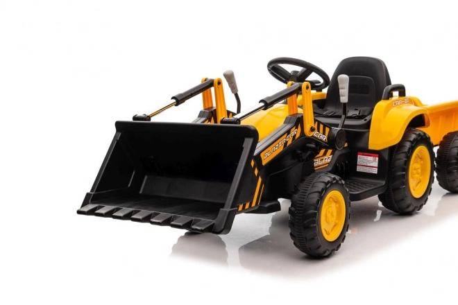 Akkumulátoros traktor kanállal sárga