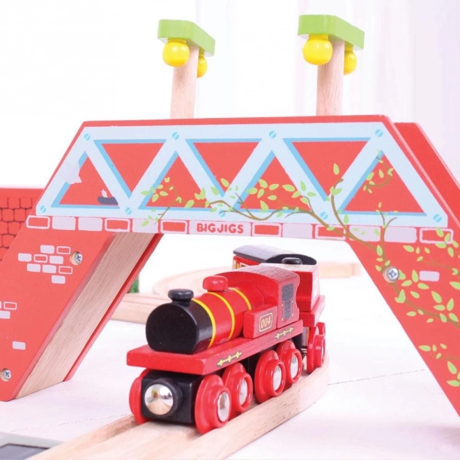 Bigjigs Rail piros mozdony tendervagonnal és 3 sínnel