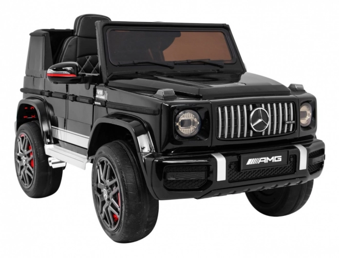Mercedes AMG G63 gyerekeknek Lakk fekete + távirányító + MP3 LED + lassú indítás + EVA + biztonsági öv