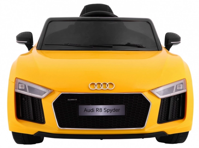 Audi R8 Spyder akkumulátorpakk Sárga + Távirányítás + EVA + Lassan indul + Rádió MP3 + LED dióda