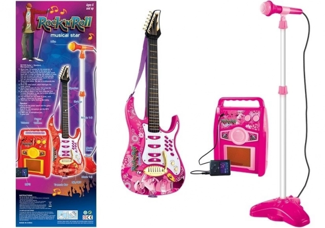 Rózsaszín elektromos gitár mikrofonnal és erősítővel gyerekeknek