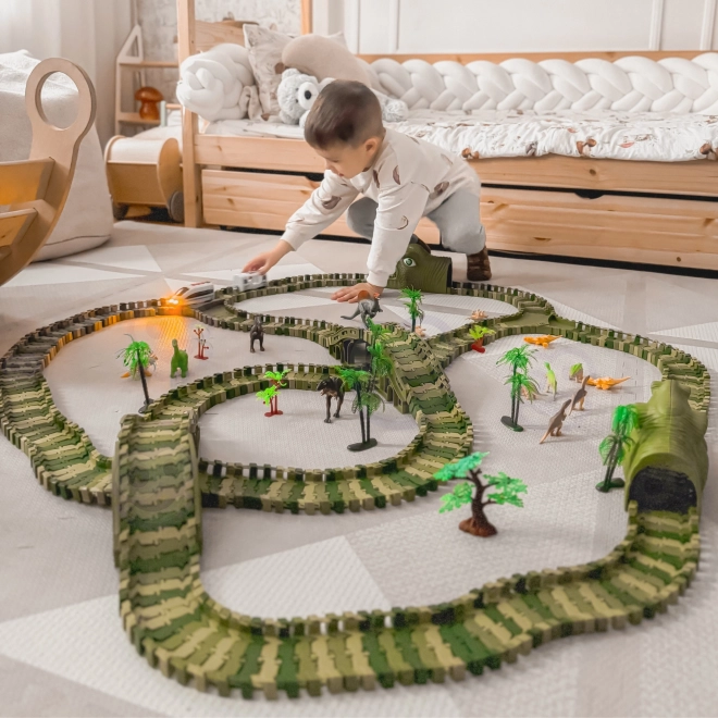 Dinoszaurusz versenypálya autóval és figurákkal