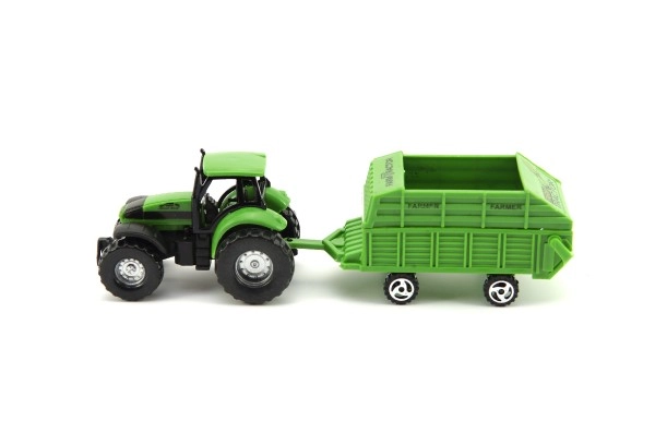 Zöld traktor valósághű utánfutóval