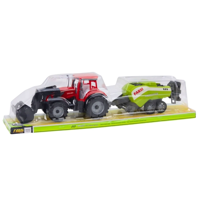 Piros traktor rakodóval és bálázóval