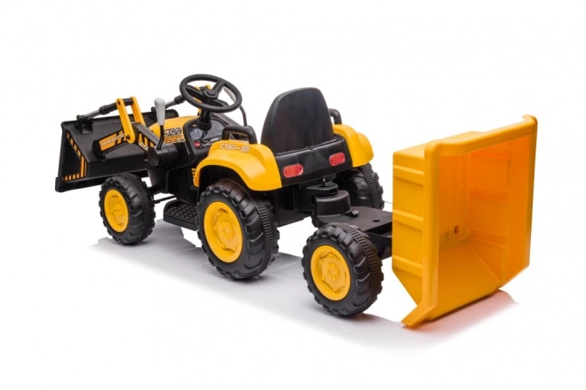 Akkumulátoros traktor kanállal sárga