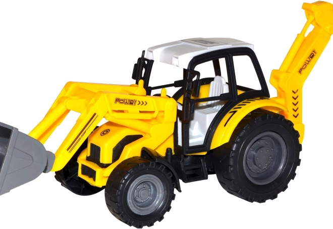 Traktor rakodókanállal lendkerekkel