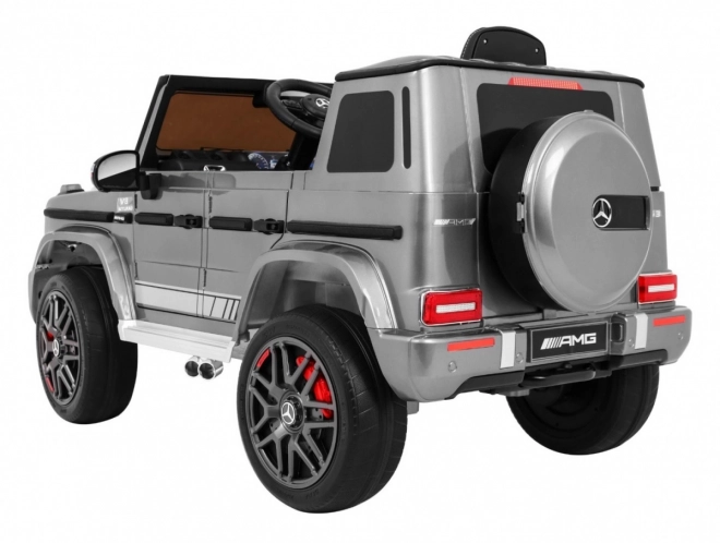 Mercedes AMG G63 gyermekeknek Ezüst festék + távirányító + MP3 LED + lassú indítás + EVA + övek