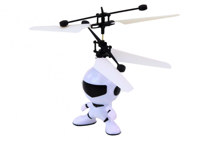Kézmozgással irányítható fehér drón helikopter