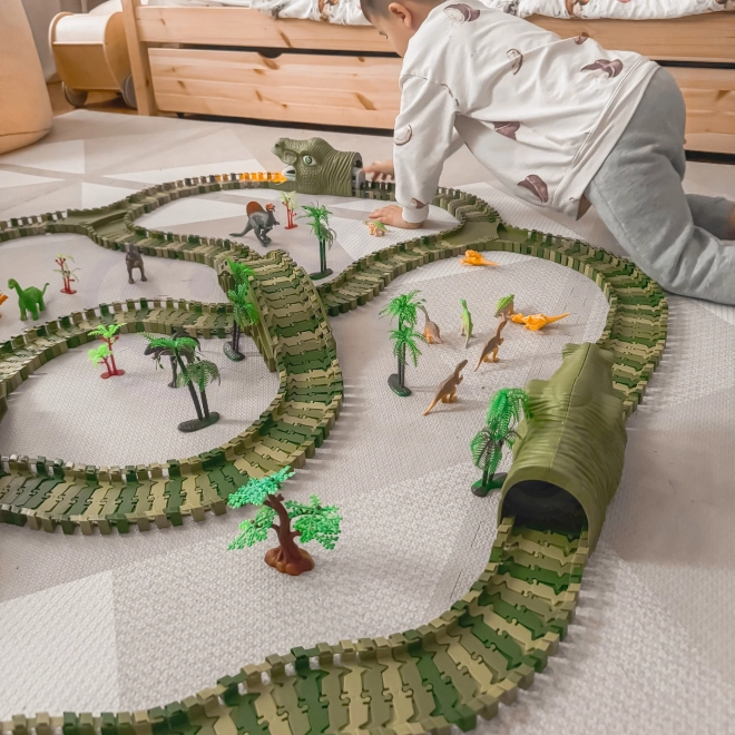 Dinoszaurusz versenypálya autóval és figurákkal