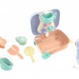 Görgős bőrönd homokozókészlettel és vízimalommal