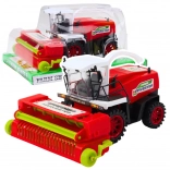 Piros mezőgazdasági kombájn meghajtással