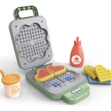 Zöld gofrikészítő kislányok háztartásába