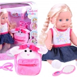 aranyos copfos baba rózsaszín hátizsákkal és szemüveggel