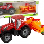 Traktor kultivátorral, lendkerekes meghajtással – piros