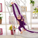 Lila plüss majmocska kölyökkel