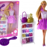 Divatbaba Lucy lila ruhával és kiegészítőkkel