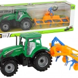 Zöld traktor gereblyével, súrlódásos meghajtással